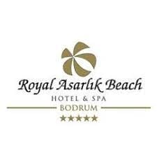 Royal Asarlık Beach Hotel & Spa için logo. Üstte stilize edilmiş, altın bir yel değirmeni simgesi ve altında zarif bir el yazısıyla “Royal Asarlık Beach” yazısı bulunur. “HOTEL & SPA” ve “BODRUM” sözcükleri altı çizilidir ve altta beş altın yıldız ortalanmıştır. Royal Asarlık Beach Hotel & Spa için logo. Üstte stilize edilmiş, altın bir yel değirmeni simgesi ve altında zarif bir el yazısıyla "Royal Asarlık Beach" yazısı bulunur. "HOTEL & SPA" ve "BODRUM" sözcükleri altı çizilidir ve altta beş altın yıldız ortalanmıştır.